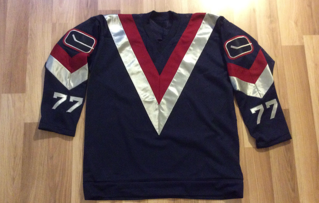black and green canucks jersey
